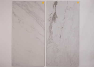 A pair of white marble tiles on a white background, perfect for custom home builders in Southern Utah Valley.