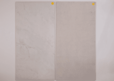 A pair of white marble tiles on a white background, perfect for a custom home build in Southern Utah Valley by Riding Homes.