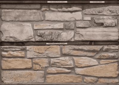 A black and white photo of a stone wall crafted by Riding Homes, a custom home builder in Southern Utah Valley.