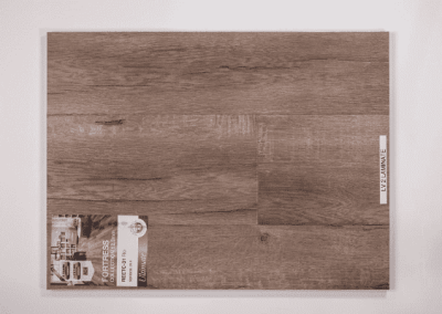 A picture of a wooden plank hanging on a wall in Southern Utah Valley.