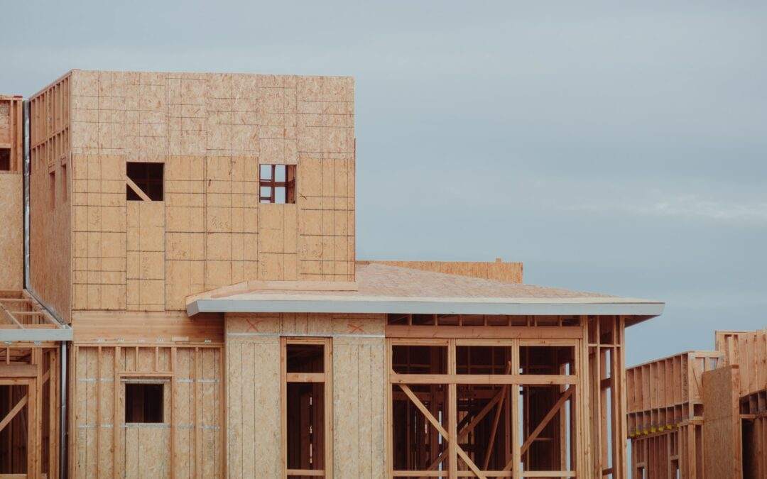 A Riding Homes custom house under construction with wooden framing in Southern Utah Valley.